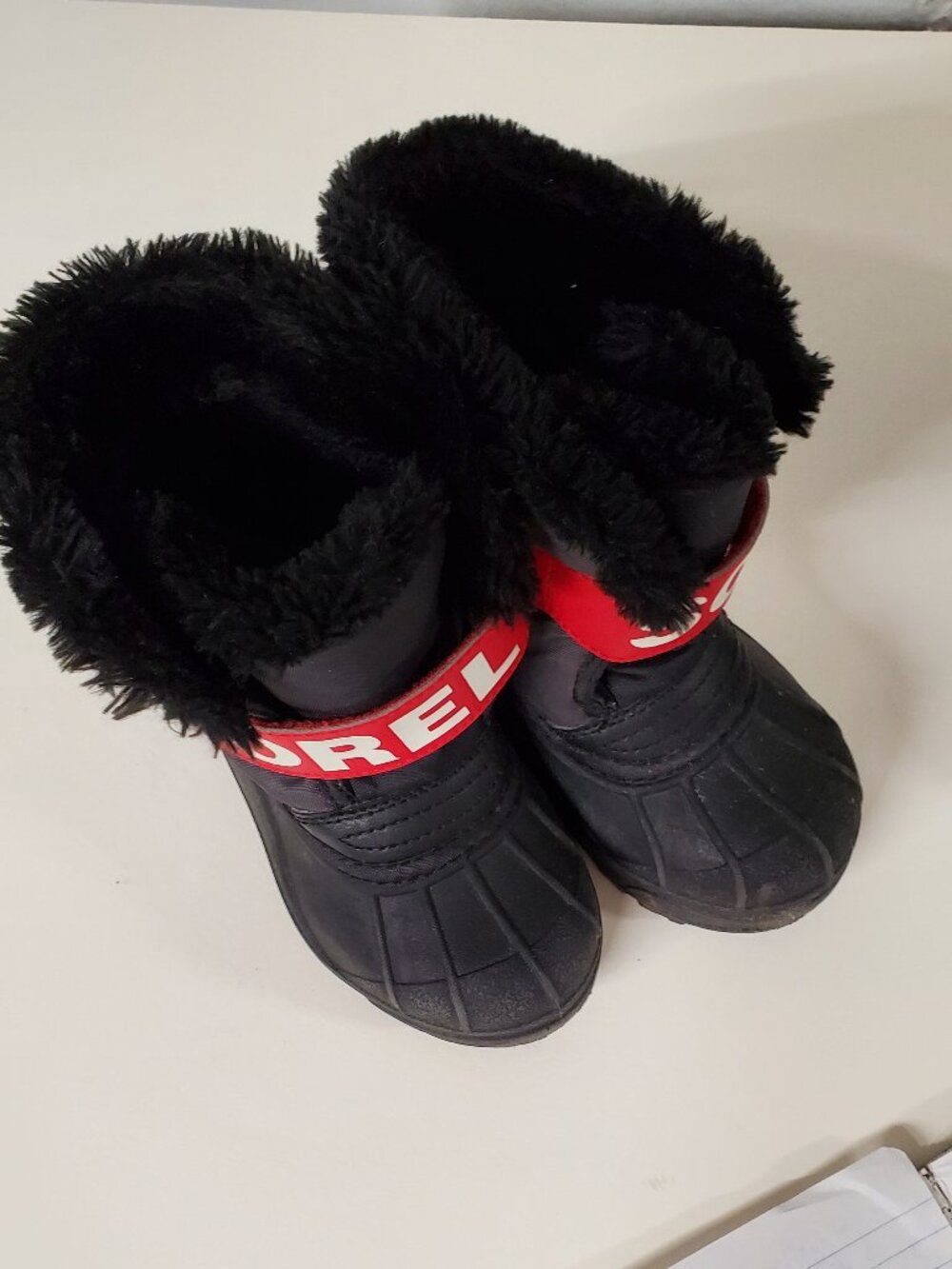 Kids snow boots by Sorel size US9
